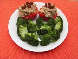 A picture of a dish with vegan stuffed peppers.