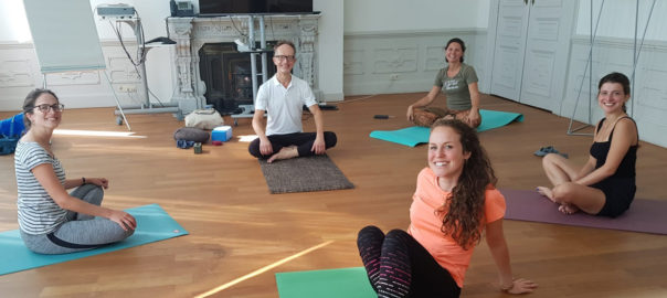 Picture of a yoga class in company