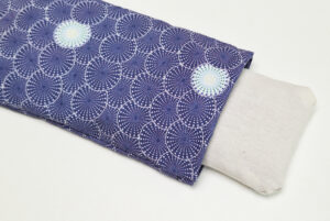 Picture of eye pillow blue sun pattern detail